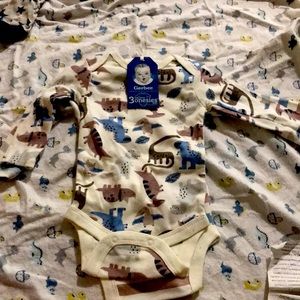 2 onesies 0-3 m Dino